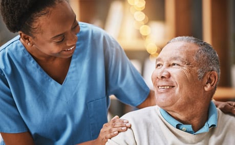 healthcare worker with older man